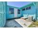 Backyard with a blue house and an air conditioning unit at 1500 S Wolcott Ct, Denver, CO 80219