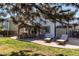 Spacious backyard patio with outdoor seating and a shed, ideal for relaxation and storage at 4969 Thorndike Ave, Castle Rock, CO 80104