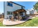 Outdoor patio area with a wooden gazebo and lounge seating, perfect for enjoying the backyard at 4969 Thorndike Ave, Castle Rock, CO 80104
