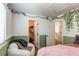 Bedroom with a beanbag chair and doorway leading to a walk in closet at 4969 Thorndike Ave, Castle Rock, CO 80104