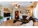 Welcoming living room with a comfortable sectional sofa, decorative details, and abundant natural light at 4969 Thorndike Ave, Castle Rock, CO 80104