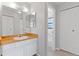 Bathroom featuring a sink, cabinets, and shower at 10970 W Florida Ave # 225, Lakewood, CO 80232