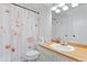 Bathroom with flower curtains and a sink at 10970 W Florida Ave # 225, Lakewood, CO 80232