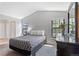 Bedroom with carpeted floors and two windows for natural light at 10970 W Florida Ave # 225, Lakewood, CO 80232