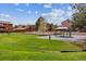Expansive community green space, picnic shelter, and mature landscaping at 331 Wright St # 108, Lakewood, CO 80228
