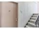 Exterior entrance showing door and stairway to apartment unit 108 at 331 Wright St # 108, Lakewood, CO 80228