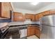 Functional kitchen with stainless steel appliances and ample counter space at 331 Wright St # 108, Lakewood, CO 80228