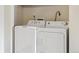A conveniently placed laundry area features a washer and dryer at 331 Wright St # 108, Lakewood, CO 80228