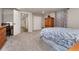 Cozy bedroom with carpet, closet, and access to hallway in this home at 27436 Kennedy Gulch Rd, Conifer, CO 80433