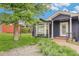 View of the home exterior with lush green lawn at 401 N Columbine St, Golden, CO 80403