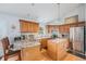Spacious kitchen with granite counters, an island, and modern appliances at 401 N Columbine St, Golden, CO 80403
