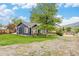 Cozy home with a well-manicured lawn and mature tree at 401 N Columbine St, Golden, CO 80403