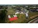 Aerial view featuring a basketball court, backyard, and impressive modern home on a sprawling lot at 2495 Red Hawk Pl, Broomfield, CO 80023