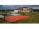 Aerial view of property showing basketball court, backyard, and stunning home exterior at 2495 Red Hawk Pl, Broomfield, CO 80023