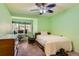 Bright bedroom, well lit with a computer and bed for comfort and efficiency at 6663 S Prescott Way, Littleton, CO 80120