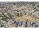 Aerial view of the neighborhood showcasing the property's location among tree-lined streets at 1579 W Briarwood Ave, Littleton, CO 80120
