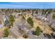 A neighborhood aerial view showcasing spacious lots, mature trees and residential architecture at 1579 W Briarwood Ave, Littleton, CO 80120