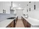 Sleek kitchen featuring contemporary cabinetry and an island at 1414 Pierce St, Lakewood, CO 80214