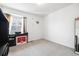 Simple bedroom with neutral walls, natural light, and ample space at 10983 Uvalda St, Commerce City, CO 80022