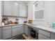 A well-appointed pantry with ample cabinet space and granite countertops at 10983 Uvalda St, Commerce City, CO 80022
