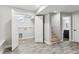 Bright basement area featuring wood-look floors, laundry area, and access to the basement bathroom at 3908 Mariposa St, Denver, CO 80211