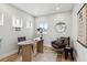 Cozy home office with natural light, a modern desk, and comfortable seating at 3908 Mariposa St, Denver, CO 80211
