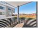 Balcony with mountain view and black railings at 12283 W 57Th Ln, Arvada, CO 80002
