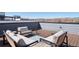 Cozy rooftop deck with comfortable seating and panoramic mountain views at 12283 W 57Th Ln, Arvada, CO 80002