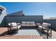 Well-appointed rooftop deck with stylish seating, perfect for entertaining guests at 12283 W 57Th Ln, Arvada, CO 80002