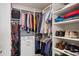 Organized walk-in closet with ample shelving and hanging space at 12283 W 57Th Ln, Arvada, CO 80002