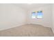 Well-lit bedroom with neutral carpet, a window, and blank walls, perfect for personalization at 14475 Lanewood St, Brighton, CO 80603