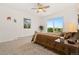 Bedroom with access to a private balcony and views of the surrounding landscape at 14475 Lanewood St, Brighton, CO 80603