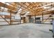 The spacious workshop interior features ample lighting and built-in work spaces at 14475 Lanewood St, Brighton, CO 80603