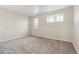 Bedroom with carpet and multiple windows at 39731 Congress Ln, Elizabeth, CO 80107