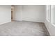 Spacious carpeted bedroom with ample natural light at 39731 Congress Ln, Elizabeth, CO 80107