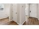 Welcoming entryway featuring wood-look floors and neutral paint at 39731 Congress Ln, Elizabeth, CO 80107