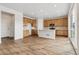 Spacious kitchen featuring stainless steel appliances, an island, and hardwood floors at 39731 Congress Ln, Elizabeth, CO 80107