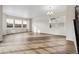 Spacious living room with large windows offering ample natural light and views at 39731 Congress Ln, Elizabeth, CO 80107