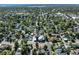 An aerial view shows the neighborhood with mature trees, surrounding the home at 4110 Yates St, Denver, CO 80212