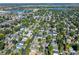 An aerial view shows the neighborhood with mature trees, surrounding the home at 4110 Yates St, Denver, CO 80212