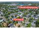 This aerial view showcases the neighborhood surrounding 4110 Yates St, with Lakeside Amusement Park in the distance at 4110 Yates St, Denver, CO 80212