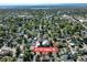 An aerial view shows the neighborhood with mature trees, surrounding 4110 Yates St at 4110 Yates St, Denver, CO 80212