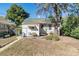 Well-maintained backyard with lush greenery, a patio area, and a peaceful retreat at 4110 Yates St, Denver, CO 80212
