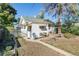 Charming backyard with a patio, perfect for outdoor dining, gardening, and relaxation at 4110 Yates St, Denver, CO 80212