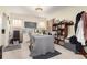 Inviting dining room featuring neutral walls, charming built-in shelving, and an abundance of natural light at 4110 Yates St, Denver, CO 80212