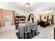 Open concept dining room featuring neutral walls, bright natural light and offering access to the living room at 4110 Yates St, Denver, CO 80212