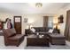 Spacious living room featuring a comfortable sofa and neutral tones, creating an inviting atmosphere at 4110 Yates St, Denver, CO 80212