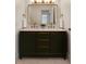 Elegant bathroom featuring double sinks, modern fixtures, and stylish vanity at 9695 E Kansas Cir # 44, Denver, CO 80247