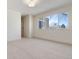 Spacious, bright bedroom with neutral carpet and natural light at 9695 E Kansas Cir # 44, Denver, CO 80247
