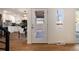 Entryway view with stairs, access to the kitchen, and a glass door leading to an outdoor area at 9695 E Kansas Cir # 44, Denver, CO 80247